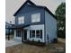 Modern two-story home with contemporary siding and a covered front entrance at 258 Lincoln Sw St, Concord, NC 28025