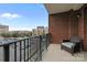 Balcony with brick siding and wrought iron railings at 300 W 5Th St # 617, Charlotte, NC 28202