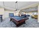 Inviting game room with a classic pool table and comfortable seating for entertainment at 300 W 5Th St # 617, Charlotte, NC 28202