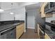 Efficient kitchen with stainless steel appliances, granite countertops, and ample cabinet space at 300 W 5Th St # 617, Charlotte, NC 28202
