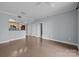 Bright living room featuring hardwood floors, neutral paint, and an open layout with kitchen views at 300 W 5Th St # 617, Charlotte, NC 28202