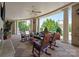 Charming outdoor patio with comfortable seating, columns, and a ceiling fan for outdoor enjoyment at 300 W 5Th St # 617, Charlotte, NC 28202