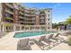 Resort-style pool with plenty of lounge chairs for relaxation and sunbathing on the deck at 300 W 5Th St # 617, Charlotte, NC 28202