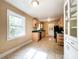Functional kitchen with tile floors, ample cabinets, and stainless steel appliances at 310 E Houston St, Monroe, NC 28112
