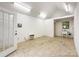 Shed interior with tile floors, natural light, utility sink, and white walls at 310 E Houston St, Monroe, NC 28112