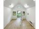 Shed interior with tile floors, natural light, and white walls at 310 E Houston St, Monroe, NC 28112