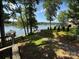 Backyard with lake views and a private dock with covered seating at 360 Lake Landing Dr, Salisbury, NC 28146