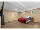 Spacious bedroom with carpet, natural light, and a comfortable bed at 360 Lake Landing Dr, Salisbury, NC 28146