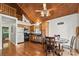 Cozy eat-in kitchen featuring stainless appliances and wooden cabinets at 360 Lake Landing Dr, Salisbury, NC 28146