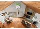 Open concept featuring a stone fireplace, wooden ceiling, and access to a deck at 360 Lake Landing Dr, Salisbury, NC 28146
