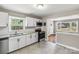 Updated kitchen featuring modern appliances, ample cabinet space, and an open layout at 4413 Tillman Rd, Charlotte, NC 28208