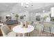 Dining area adjacent to kitchen with stylish furnishings and an open layout at 4472 Pebblebrook Sw Cir, Concord, NC 28027