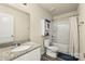 Well-lit bathroom featuring granite countertops, white vanity, and a shower-tub combination at 473 Wendover Dr, Salisbury, NC 28147