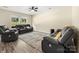 Relaxing living room with comfortable recliners, ceiling fan, and wood-look flooring at 473 Wendover Dr, Salisbury, NC 28147