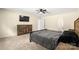 The main bedroom is spacious and features carpet, neutral walls, ceiling fan, and an en-suite bath at 473 Wendover Dr, Salisbury, NC 28147