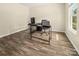 A bright office space with wood-look floors, perfect for a home office or study at 473 Wendover Dr, Salisbury, NC 28147