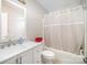 Bathroom featuring a single vanity, toilet, and a shower with a curtain at 4835 Chesney Nw St, Concord, NC 28027