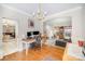 Spacious dining room with access to the living room, featuring a work from home set up at 4835 Chesney Nw St, Concord, NC 28027