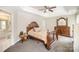 Relaxing main bedroom with a plush carpet, dark furniture, and a Primary bathroom at 4835 Chesney Nw St, Concord, NC 28027