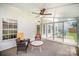Relaxing sunroom featuring large windows and ample seating at 4835 Chesney Nw St, Concord, NC 28027