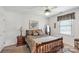 Cozy bedroom with a decorative ceiling fan, neutral paint, and a comfortable bed at 511 Birmingham Ct, Rock Hill, SC 29732