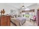 Comfortable bedroom offers a large window and chair bathed in natural light at 511 Birmingham Ct, Rock Hill, SC 29732