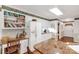 The well-lit kitchen features a built-in desk, white appliances and a marble countertop at 511 Birmingham Ct, Rock Hill, SC 29732