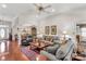 Inviting living room with an open layout, hardwood floors, and comfortable gray furniture at 511 Birmingham Ct, Rock Hill, SC 29732