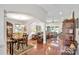Open concept living area with hardwood floors, a dining table, and comfortable seating at 511 Birmingham Ct, Rock Hill, SC 29732