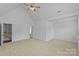 Bedroom featuring a ceiling fan, and doorway leading to hallway with a staircase at 516 Cool Creek Dr, Rock Hill, SC 29732