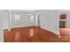 Elegant dining room with wainscoting and hardwood floors at 516 Cool Creek Dr, Rock Hill, SC 29732