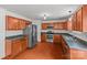 Open-concept kitchen with stainless steel appliances and wood cabinets at 516 Cool Creek Dr, Rock Hill, SC 29732