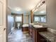 Bathroom featuring double sinks, tub, and a shower at 5321 State Line Rd, Marshville, NC 28103