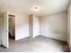 An additional bedroom featuring a neutral color palette and carpeted flooring providing a blank canvas at 5321 State Line Rd, Marshville, NC 28103