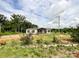 Charming single-story home with a inviting front porch and surrounded by lush greenery at 5321 State Line Rd, Marshville, NC 28103