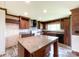 Beautiful kitchen with granite countertops, an island, and stainless steel appliances at 5321 State Line Rd, Marshville, NC 28103