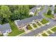 Aerial view of townhome community with mature trees, well-kept lawns, and accessible parking at 6000 Boathouse Ln # C, Cramerton, NC 28032