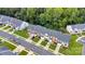 Aerial view of townhomes featuring well-manicured lawns and ample parking at 6000 Boathouse Ln # C, Cramerton, NC 28032
