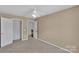 Bedroom with neutral carpet, ceiling fan and closet at 6000 Boathouse Ln # C, Cramerton, NC 28032