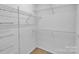 Walk-in closet with metal storage shelving for maximum storage at 6000 Boathouse Ln # C, Cramerton, NC 28032