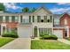 Charming townhome with green shutters, well-maintained lawn, and attached one-car garage at 6000 Boathouse Ln # C, Cramerton, NC 28032
