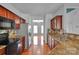 Well-appointed kitchen with stainless steel appliances and granite countertops at 6000 Boathouse Ln # C, Cramerton, NC 28032