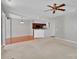 Open-concept living area with hardwood floors transitions to carpet and offers kitchen access and neutral walls at 6000 Boathouse Ln # C, Cramerton, NC 28032