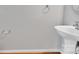 Simple and clean powder room with pedestal sink, neutral walls, and essential fixtures for guests at 6000 Boathouse Ln # C, Cramerton, NC 28032