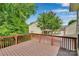 This wood deck overlooks a green lawn, perfect for summer evenings at 6000 Boathouse Ln # C, Cramerton, NC 28032