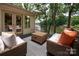 Relaxing deck features comfortable seating and stunning lake views at 6259 River Cabin Ln, Charlotte, NC 28278