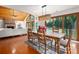 Open concept with a dining room and living room with waterfront views at 6259 River Cabin Ln, Charlotte, NC 28278