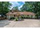 Charming home with a well-maintained lawn, beautiful landscaping, and a spacious concrete driveway at 6259 River Cabin Ln, Charlotte, NC 28278