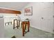 Upstairs office space with a glass desk at 6259 River Cabin Ln, Charlotte, NC 28278