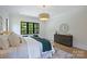 Serene bedroom with a comfortable bed, natural light, and refined decor at 7011 Chateau Bordeaux Ln, Charlotte, NC 28270